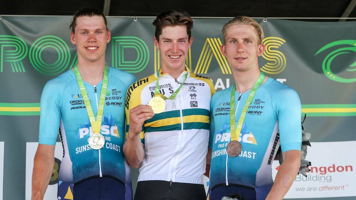 PODIUM: Former Wagga star Cameron Scott (right) celebrates after taking bronze at the under 23 men's criterium in ballarat last week. Picture: Cycling Australia/Con Chronis