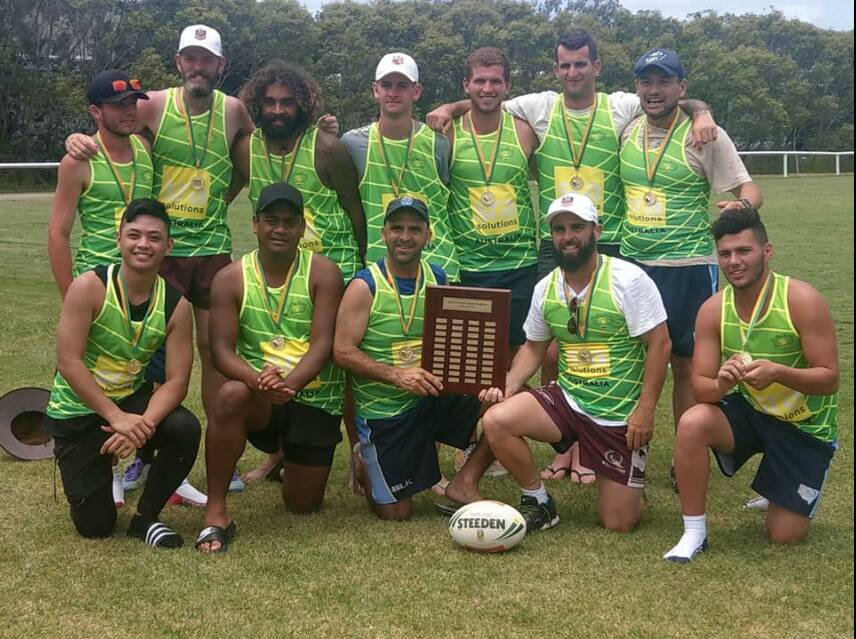 TOP EFFORT: Wagga's Matt Shannon (back row, far right) with the Australian National Deaf Touch Football side after defeating New Zealand. 