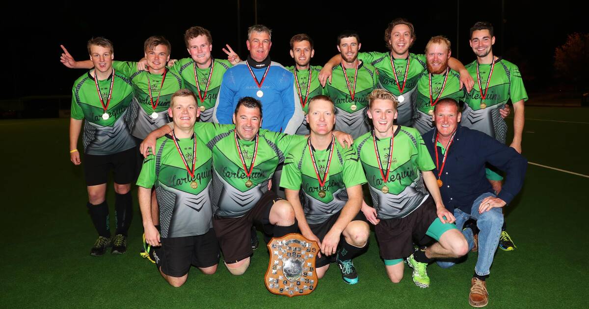 GREEN MACHINE: Harlequins celebrate their Wagga Hockey division one premiership after defeating Lake Albert 4-3 in the grand final. Picture: Emma Hillier