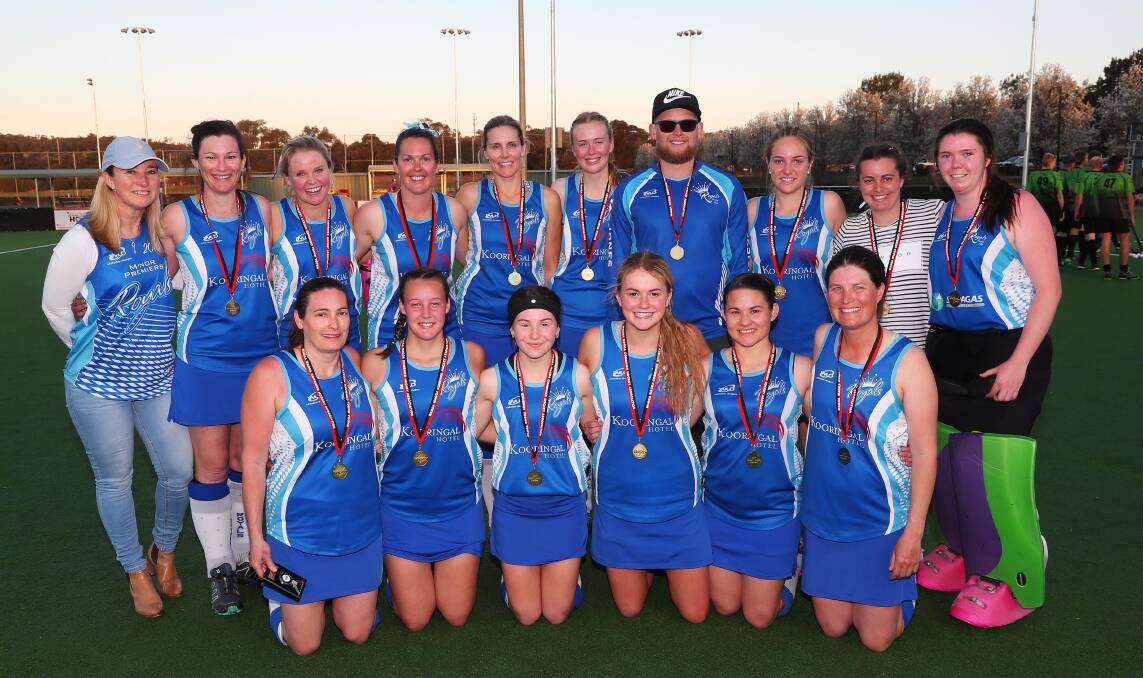 SEA OF BLUE: Royals celebrate another grand final victory after notching a 4-0 win over LAC United in the grand final. Picture: Emma Hillier