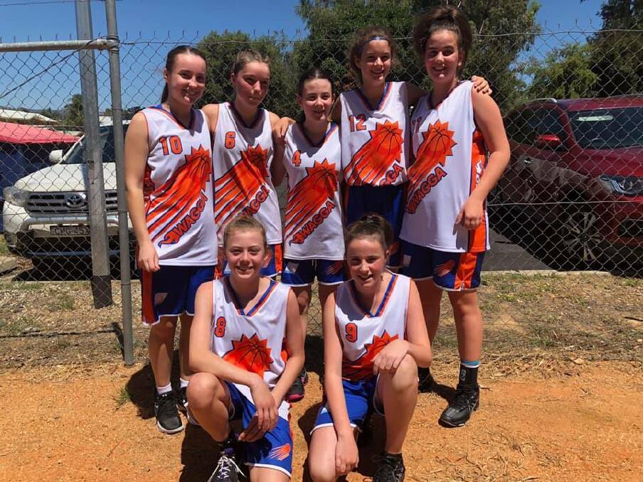 WINNERS IN WODONGA: The under 16 girls side were the cream of Wagga's junior representative crop, emulating their Blaze heroines and taking out the division three title. Picture: Supplied