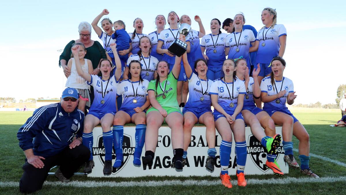 CELEBRATION TIME: Tolland get the party started after defending their Leonard Cup title and defeating Henwood Park 2-1. Picture: Les Smith