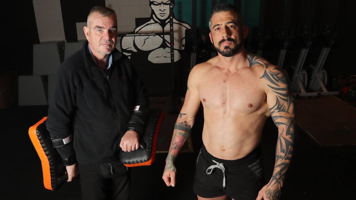Boxing trainer Glen Kelk and CrossFit Wagga owner Aaron Pearce.