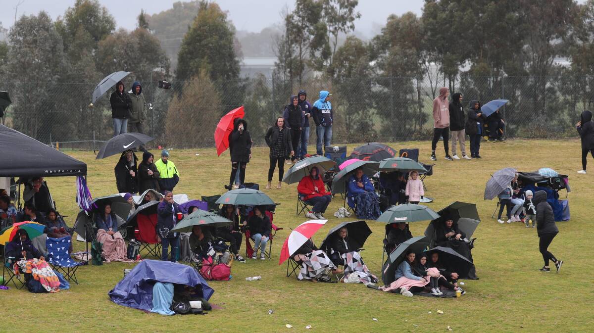 RAINY: Bad weather may have impacted this year's grand final ticket sales. 