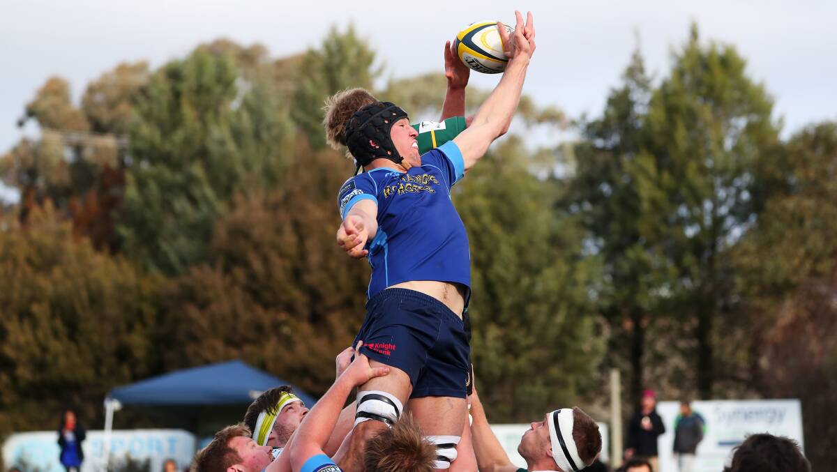 HIGH-FLYER: Rivcoll Old Boys' Medal recipient Harry Hosegood springs in front of Ag College's Matt Harris to disrupt a line out during the grand final. Picture: Emma Hillier