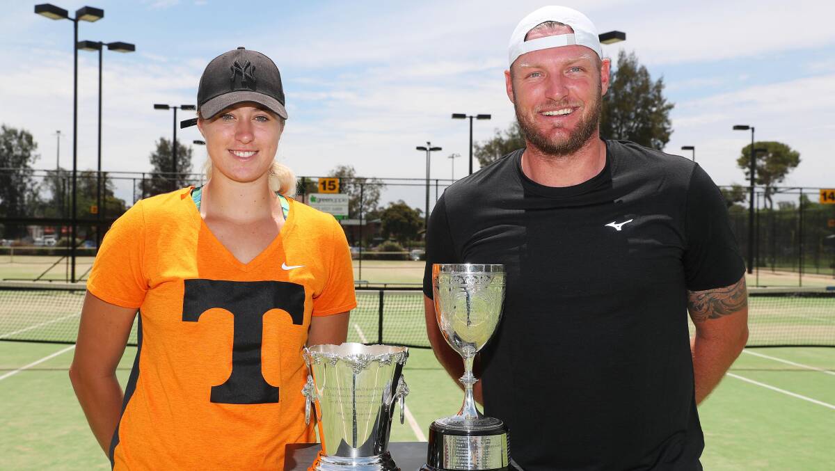 STAR POWER: Wagga tennis sensation Kaitlin Staines and former Australian Davis Cup star Sam Groth with the Sydney International trophies at Jim Elphick Tennis Centre. Picture: Emma Hillier