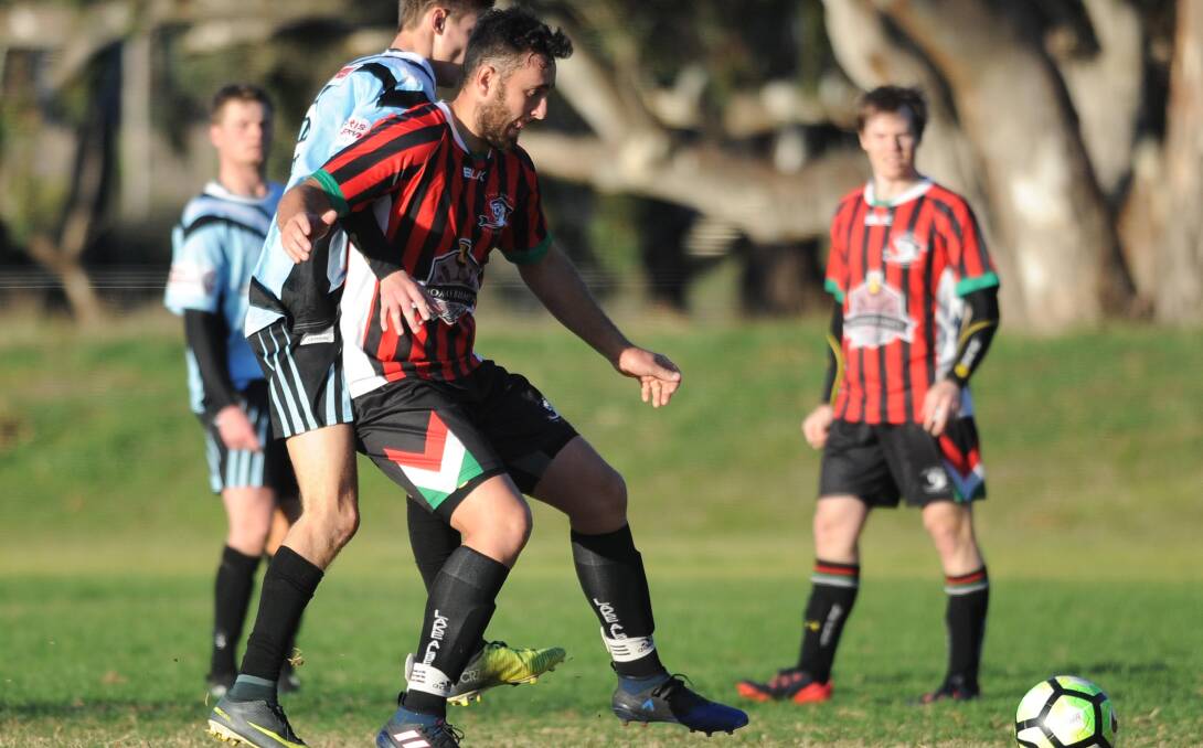 DEFENCE: Kane Baumer fights for possession during a previous Pascoe Cup game against Cootamundra. 