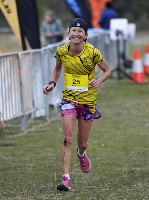 FINAL STEPS: Wagga marathon runner Rachel Glasson breaks into a grin as she charges down the final stretch during Sunday's Wagga Trail Marathon at Pomingalarna Park. Picture: Chelsea Sutton