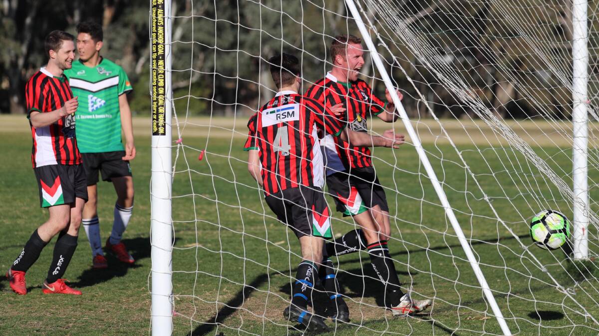 BACK OF THE NET: Lake Albert's Duncan Brodie celebrates scoring his second goal during the Sharks' 4-1 win over South Wagga Warriors on Sunday at Rawlings Park. Picture: Les Smith