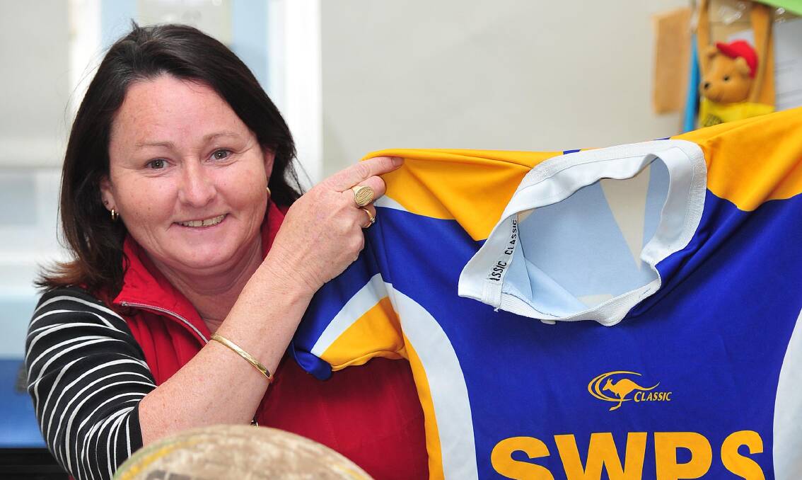 MASTER COACH: Helen Cooper has won 11 touch football titles in 22 years at SWPS. 