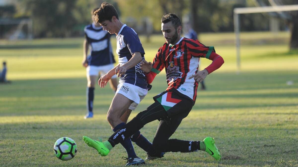 STEP AHEAD: Young Lions star Patrick Hislop gets in front of Lake Albert co-captain Fred Gardner during a Pascoe Cup clash in 2017. Picture: Les Smith