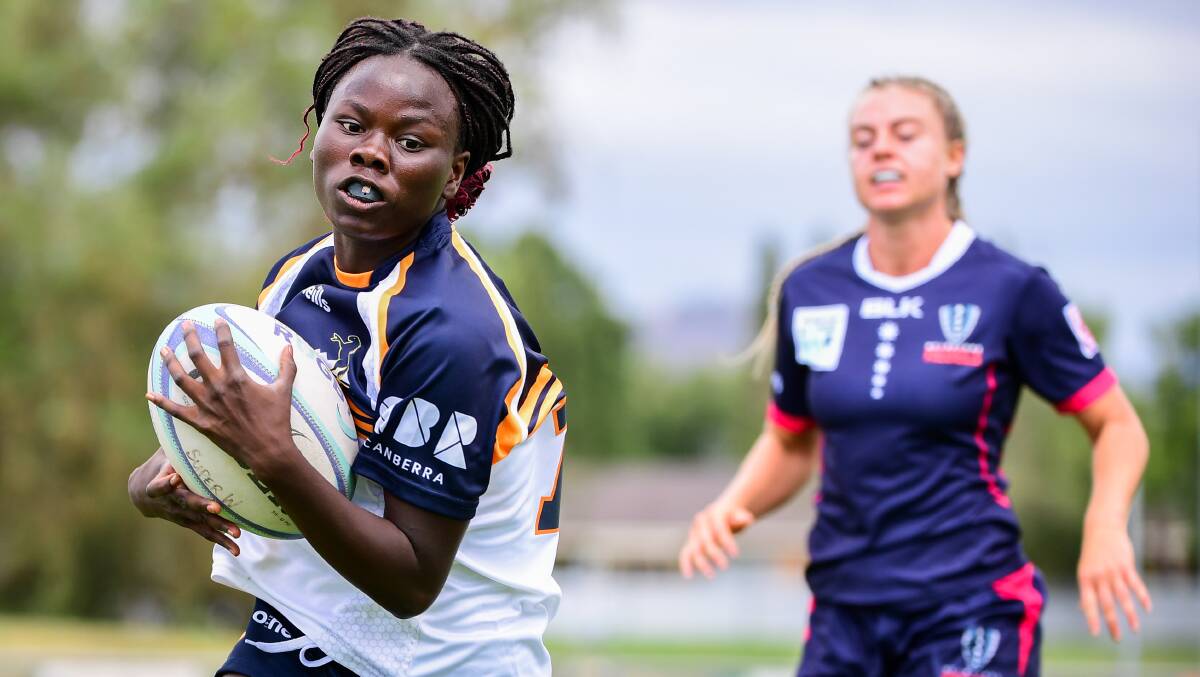 FLYING FINISH: CSU Reddies and Brumbies winger Biola Dawa storms into the right corner for a try during her side's 19-5 Super W trial match win over Melbourne. Picture: Stuart Walmsley/Rugby AU Media