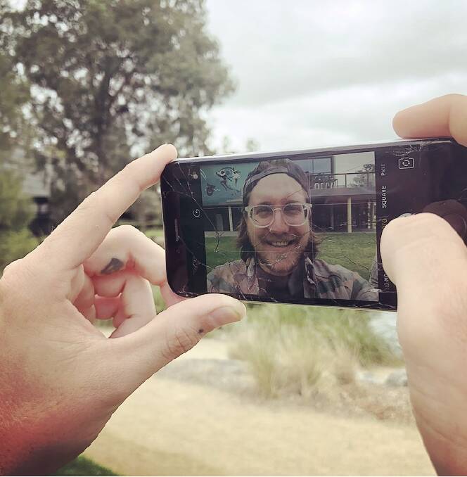 HOW-TO GUIDE: Wagga photographic artist Jacob Raupach will lead a workshop on smart phone photography this week. Picture: Lachlan Grey
