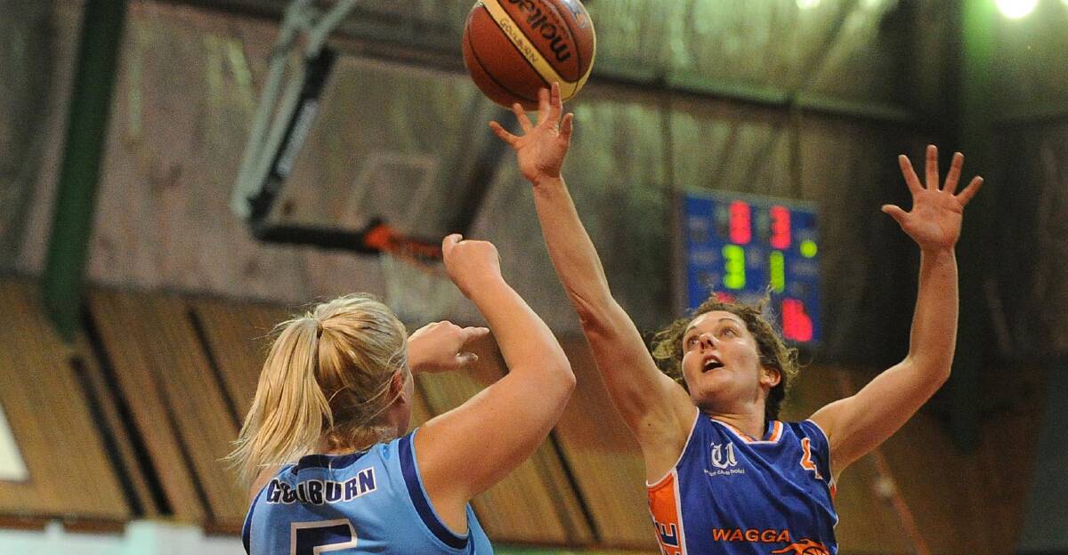 BACK ON TRACK: Wagga Blaze veteran Summa Stephens (right) is set to return for her side's finals campaign after sustaining a hand injury at training last month.  