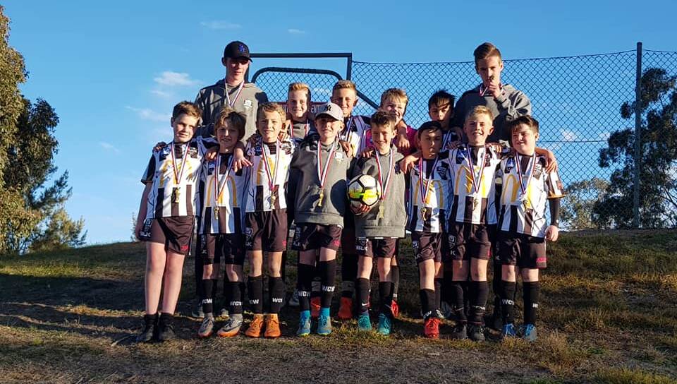 TEAM EFFORT: Wagga's under 10s boys with their medals. Picture: Wagga City Wanderers