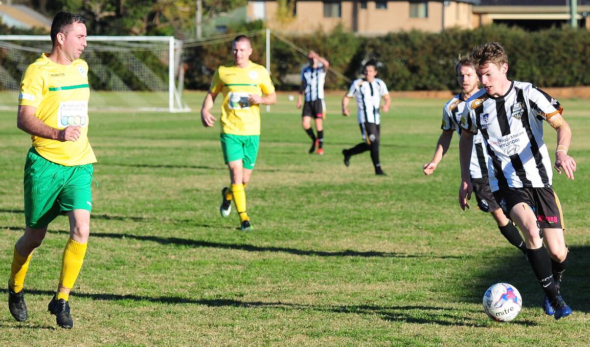 HEAD KNOCK: Shaun Moffat (right) was another casualty against Bankstown FC during Saturday's 3-0 loss. 