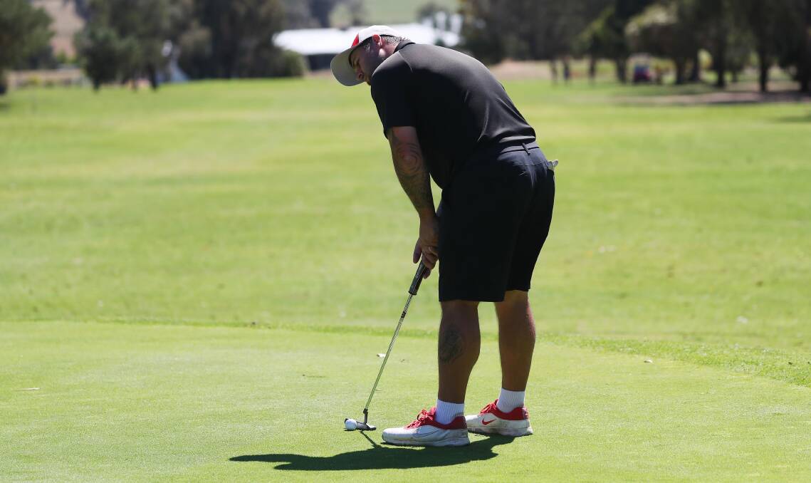 PICTURE OF CONCENTRATION: Kyle Harrison lines up a putt during the final round of the Wagga City Golf Championship. Harrison eventually emerged a 10-shot victor after seeing off Mick Hazell. Picture: Emma Hiller