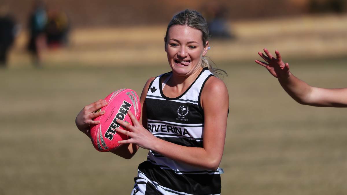 RUNAWAY: Bronte Prestage powers ahead for Riverina during the NSWCHSSA secondary touch football championships at Jubilee Park in Wagga. Picture: Emma Hillier