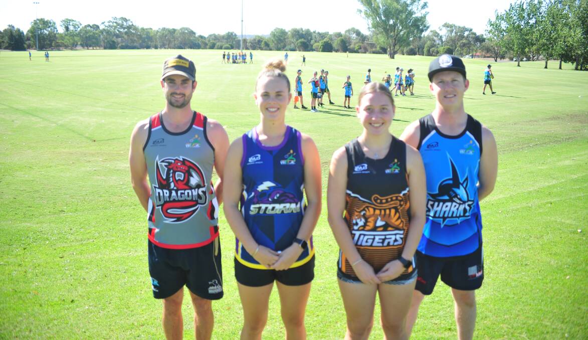 NEW COLOURS: Chris Dowell, Sophie Quirk, Lucy Anderson and Alex McKenzie show off the teams for Wagga Touch Association's upcoming mixed touch competition - the Dragons, the Storm, the Tigers and the Sharks. 