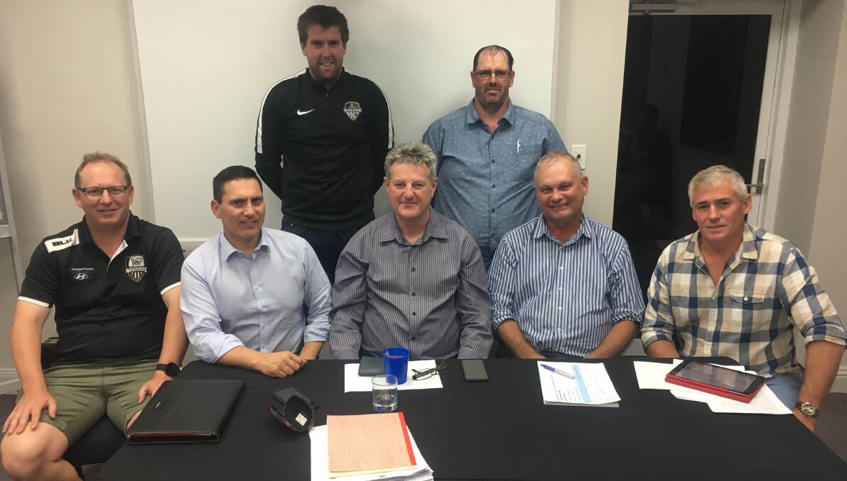 GOAL SETTING: Football Wagga's new board (back, from left - Liam Dedini, Jason McKenzie, Brendan Flanagan, David Merlino, Tony Dobbin, Mark Stephens and Tim Bart) want to push for better facilities and more referees in 2019.