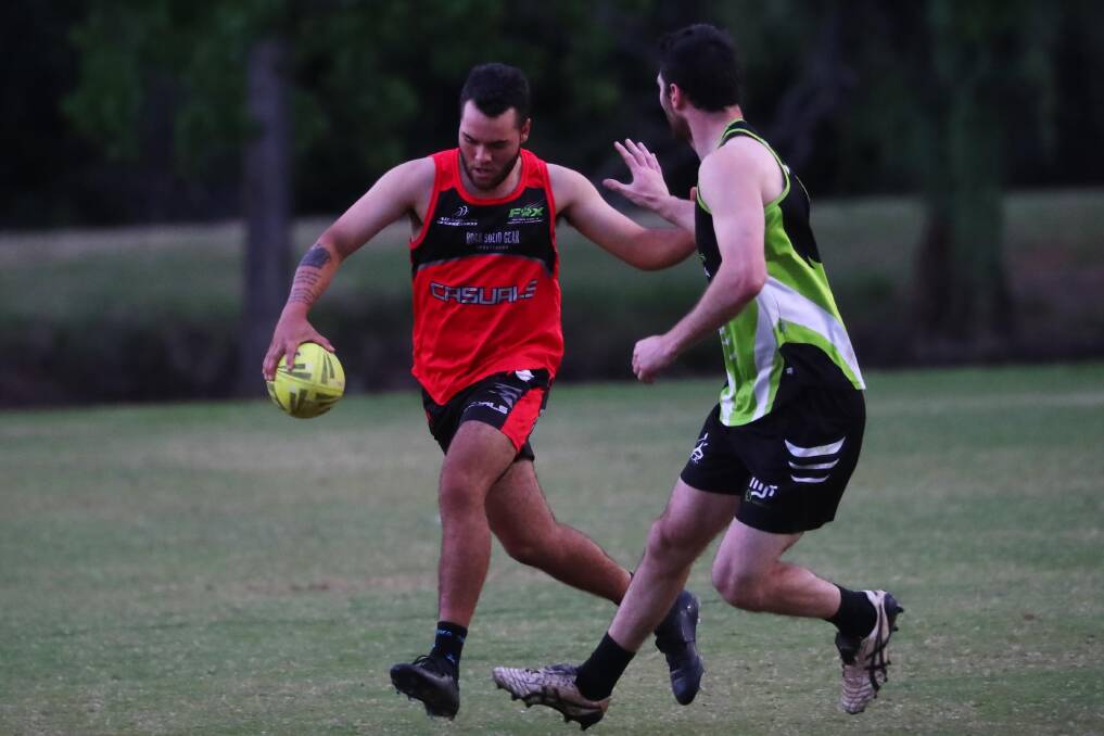 TAKE THE TOUCH: Tyson McLachlan makes contact with MJR Electrics defence during their most recent encounter in the men's premier grade competition. Picture: Emma Hillier