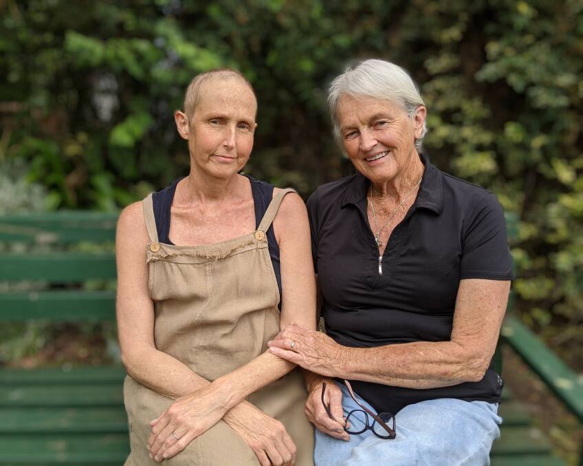 SIDE BY SIDE: Joan Parker has been in Melbourne for a month, unable to return to her Thurgoona home, caring for her terminally ill daughter Deborah Cavaye