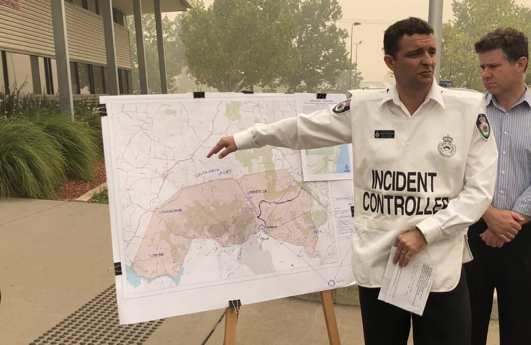 MAPPED OUT: NSW RFS Green Valley incident controller Superintendent Pat Westwood warns residents to leave now. 