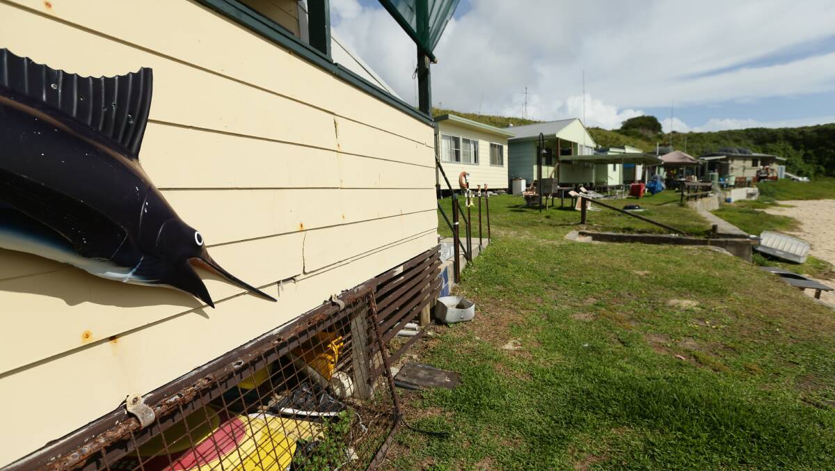 Marlin hut and its neighbours along Esmeralda Cove. Picture: Jonathan Carroll