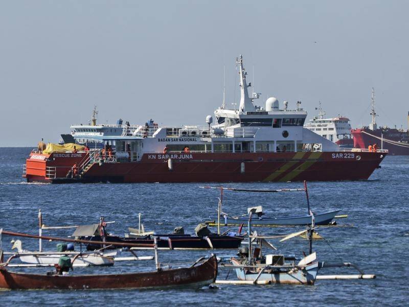 Rescuers continue their search for an Indonesian submarine that disappeared on Wednesday.