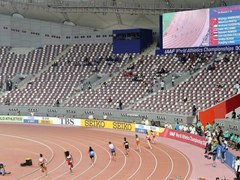 Athletes have competed in front of tiny crowds at the world athletics championships in Qatar.
