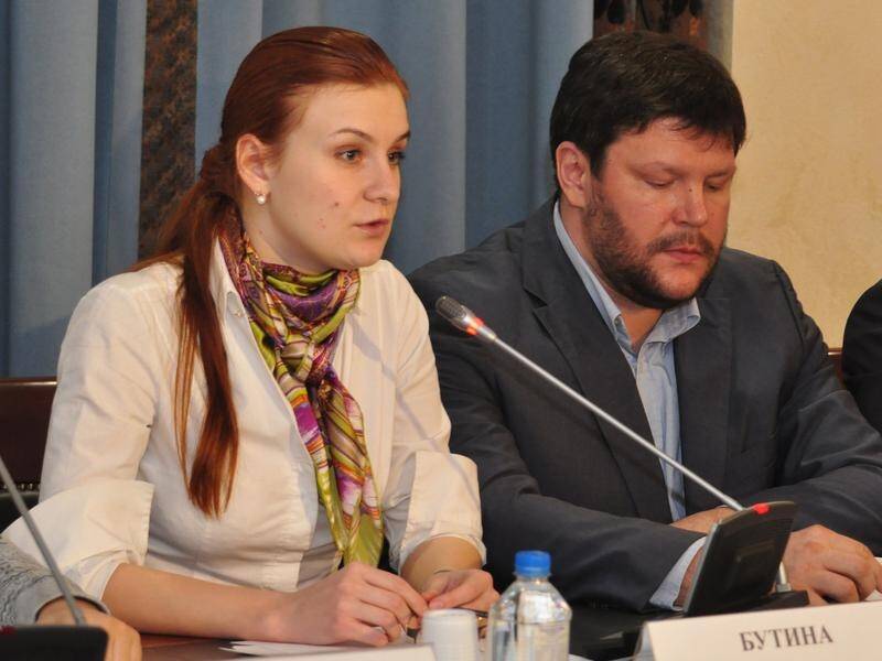 Maria Butina(L) has been ordered jailed pending trial over allegations of acting as a Russian agent.