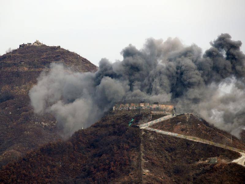 South Korea is demolishing its guard posts inside the DMZ under an agreement with the North.