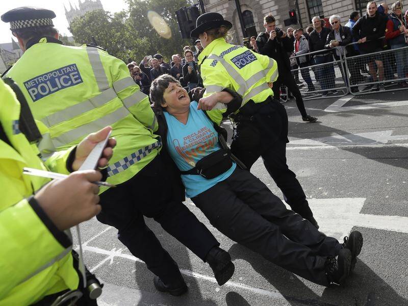 Police have arrested another 200 climate activists on a second day of protests in London.