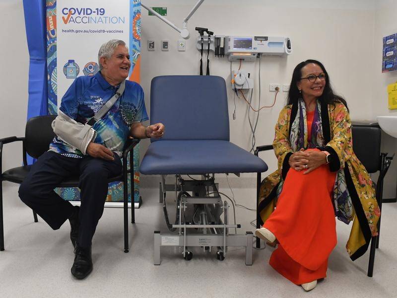 Indigenous federal MPs Ken Wyatt and Linda Burney received their first COVID jabs in Canberra.