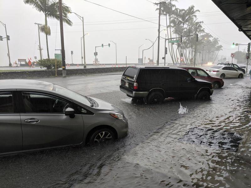 A flood warning has been issued in Hawaii after Hurricane Lane drenched the islands.