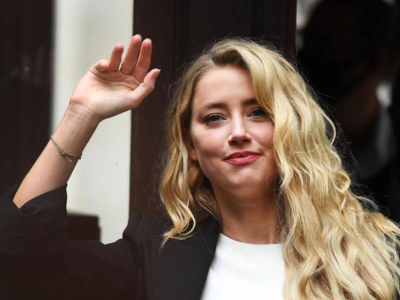 Johnny Depp's former wife Amber Heard arrives at the Royal Courts of Justice in London.