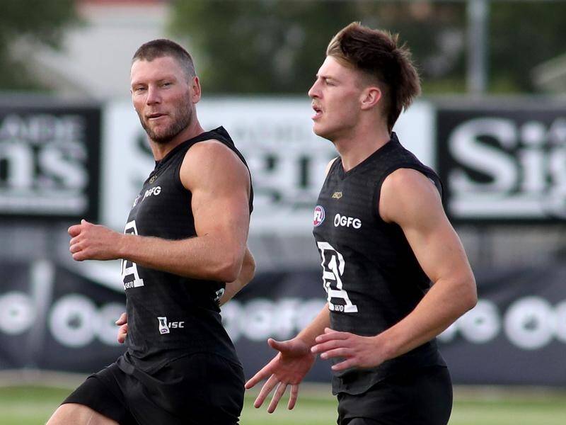 Dylan Williams (r) is poised to become Port Adelaide's fourth AFL debutant this season.