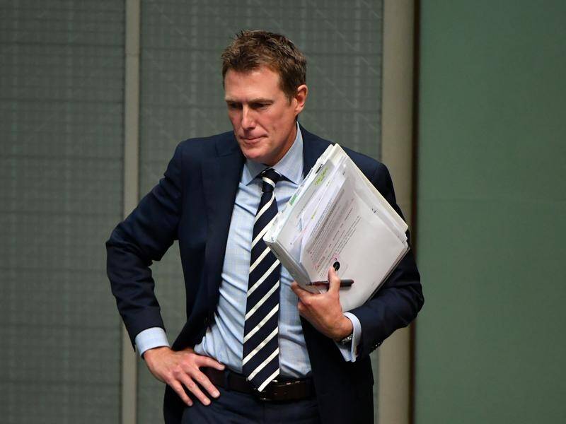 Christian Porter says as many as 8000 extra cases can be resolved annually by a court merger.
