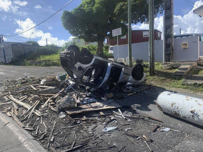 Some protests against vaccine mandates for health workers in Guadeloupe have turned into riots.