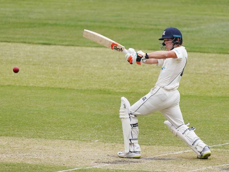 Teenager Jake Fraser-McGurk has scored a half-century on his Sheffield Shield debut for Victoria.