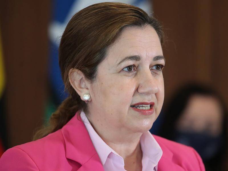 Ms Palaszczuk says it's too risky to send children back to school as the virus outbreak peaks.