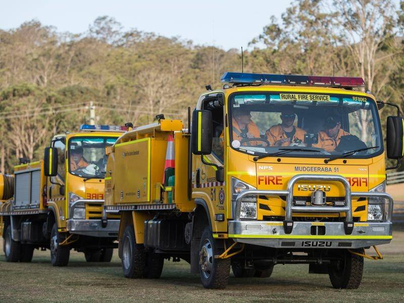 Queensland firefighters will lead a Christmas convoy of police and emergency workers through Logan.
