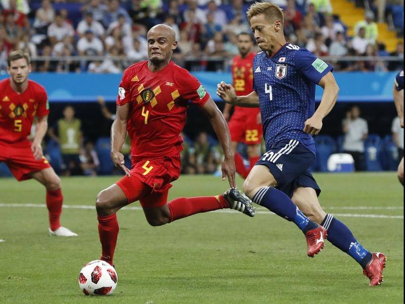 Japanese star Keisuke Honda (R) is being linked with a move to A-League champions Melbourne Victory.