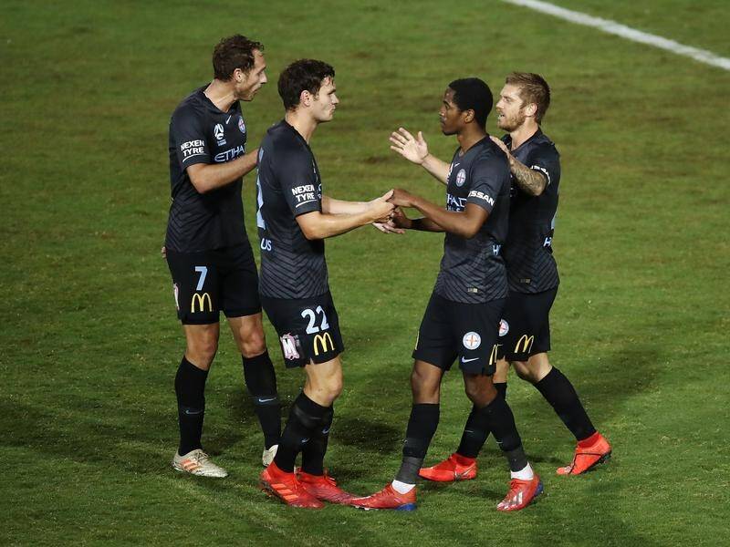 Melbourne City players celebrate Shayon Harrison's opening goal against Sydney FC.