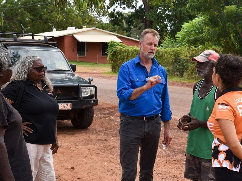 Indigenous Affairs Minister Nigel Scullion speaks with locals in the Tiwi Islands.