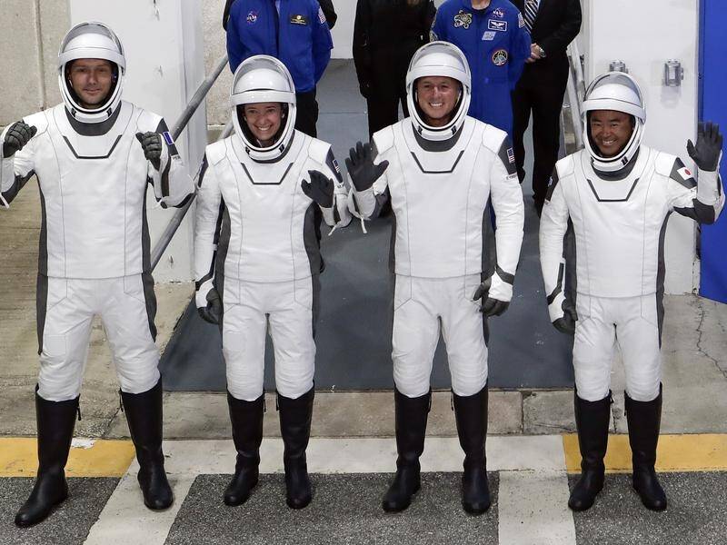 NASA and rocket company SpaceX have launched four astronauts to the International Space Station.