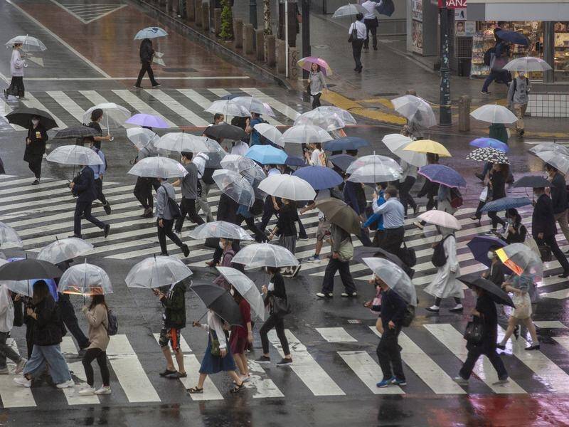 The Tokyo area was getting heavy rain and blowing wind due to Typhoon Mindulle off Japan's coast.
