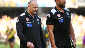 Port coach Ken Hinkley (left) is doing his best to play down the MCG clash with Collingwood. (Morgan Hancock/AAP PHOTOS)