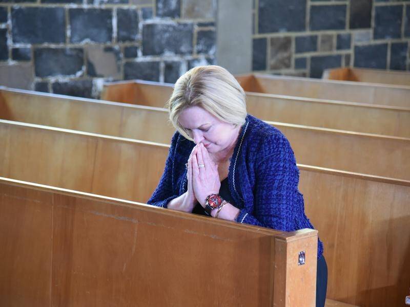 NZ Opposition Leader Judith Collins stopped to pray before voting early in the coming election.