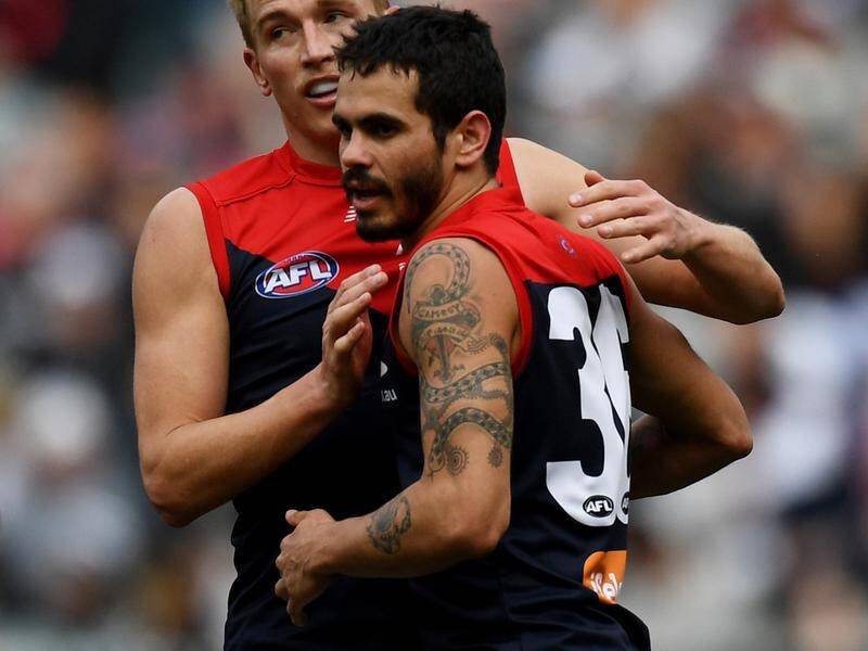 Melbourne's Jeff Garlett needs to work on his form to win an AFL recall, says coach Simon Goodwin.